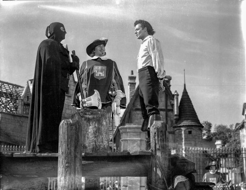 At Swords Point Movie Scene with Two Men Talking Photo Print - Item # VARCEL702349