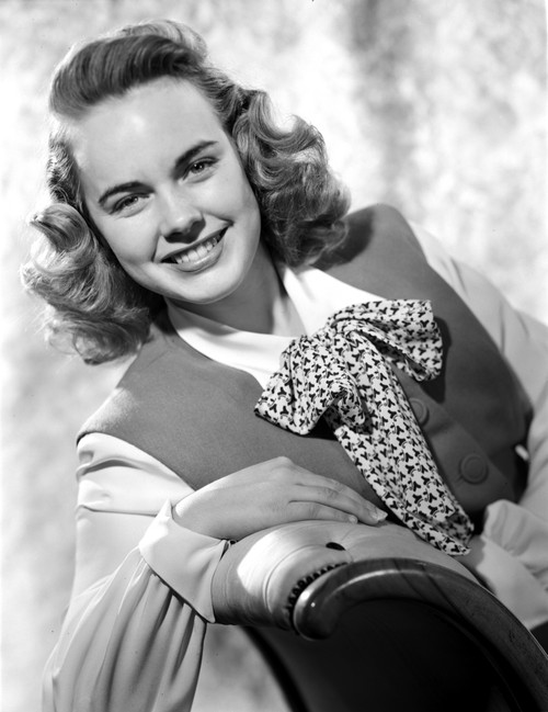 Terry Moore Seated and Leaning in Classic Photo Print - Item # VARCEL702350