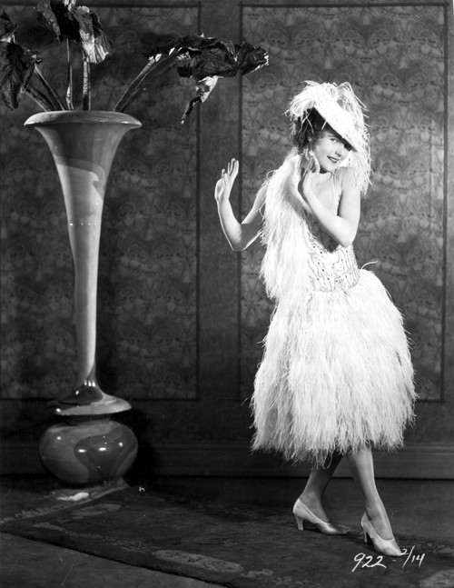 Lois Moran on a Thick Furry Dress and Hat Photo Print - Item # VARCEL702384