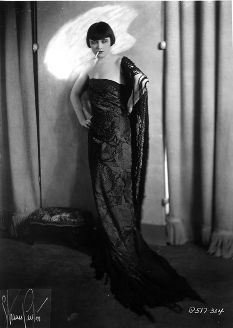 Pola Negri on Embroidered Dress standing Photo Print