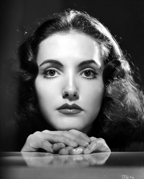 Joan Newton Chin Leaning on Hands Photo Print - Item # VARCEL702602