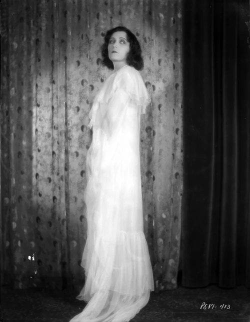 Pola Negri on a Lace Dress standing Photo Print