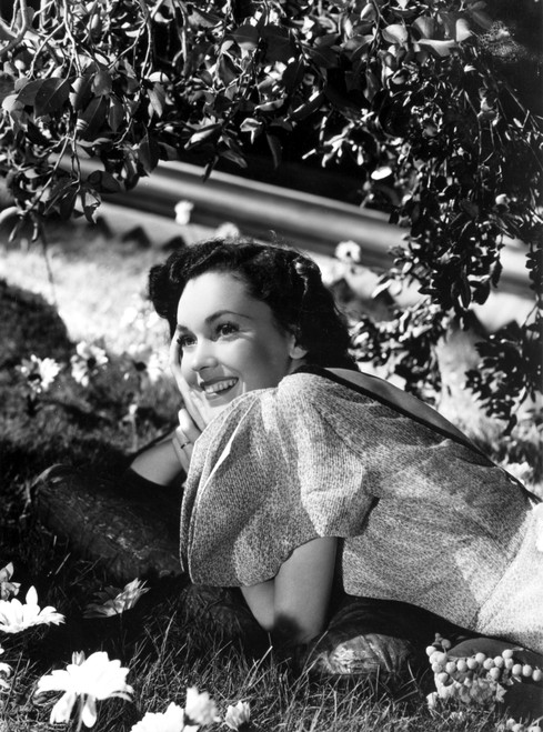 Maureen O'Sullivan Lying on the Grass and smiling Photo Print - Item # VARCEL702723