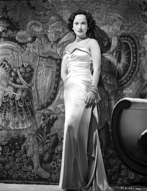 Merle Oberon on a Silk Dress standing Photo Print - Item # VARCEL702818