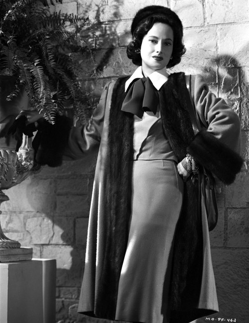 Merle Oberon Posed in Furry Coat with Ribbon Photo Print - Item # VARCEL702798