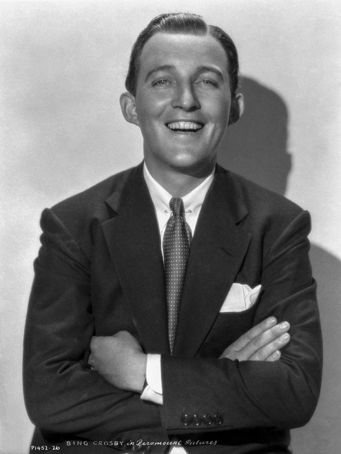 Bing Crosby smiling with Arms Crossed in Tuxedo with White Background Photo Print - Item # VARCEL688823