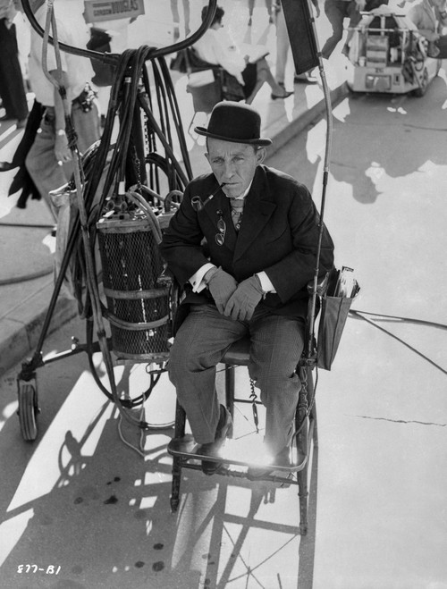 Bing Crosby Seated wearing Formal Outfit with Hat Photo Print - Item # VARCEL688849