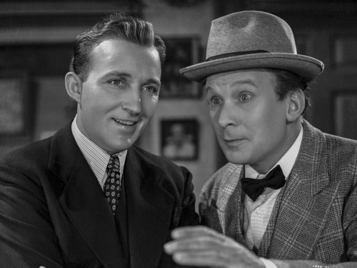 Bing Crosby Talking with Man wearing Formal Suit with Hat Photo Print - Item # VARCEL688852