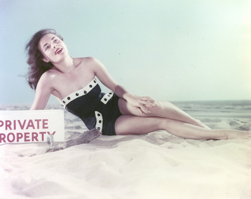 Kathleen Crowley Reclining in Black Swimsuit Photo Print - Item # VARCEL688892