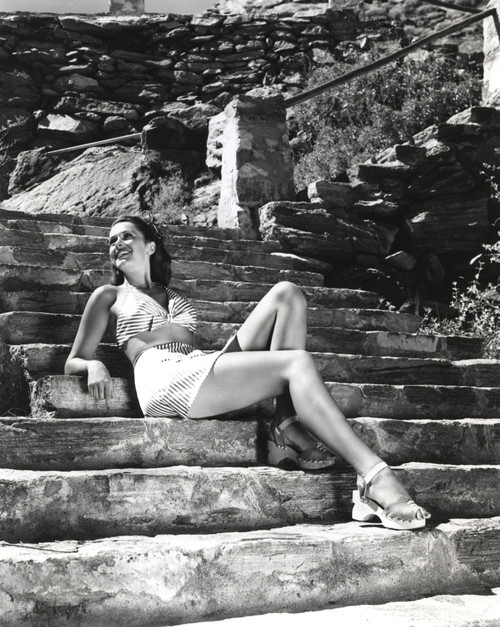 Jinx Falkenburg sitting on the Stone Stairs Photo Print - Item # VARCEL688973