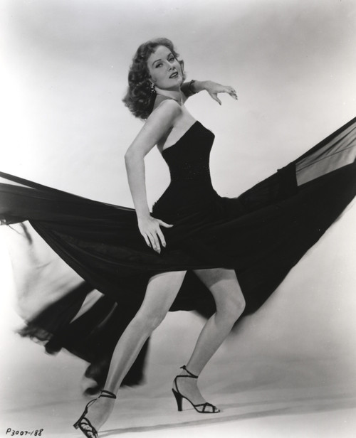 Rhonda Fleming wearing a dress and high heels Photo Print - Item # VARCEL689124