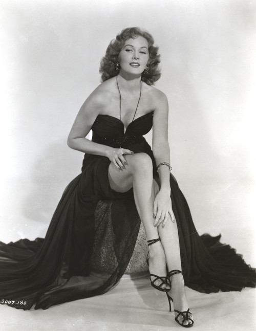 Rhonda Fleming wearing an evening gown and high heels Photo Print - Item # VARCEL689137
