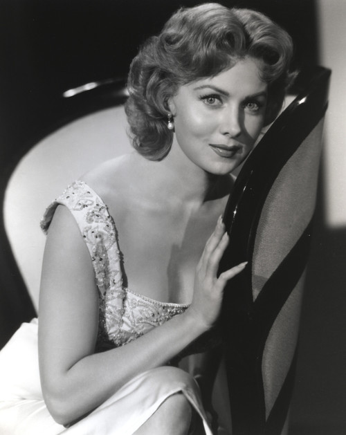 Rhonda Fleming sitting and Leaning on a Chair Photo Print - Item # VARCEL689148