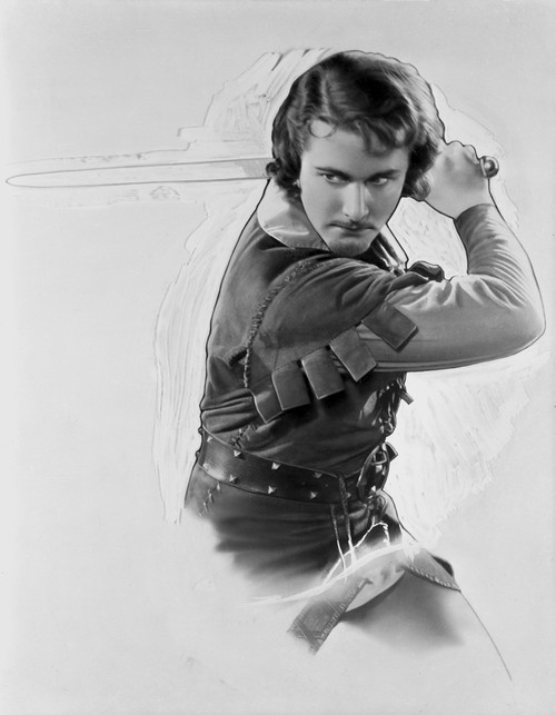 Errol Flynn in a Fighting Pose Photo Print - Item # VARCEL689261