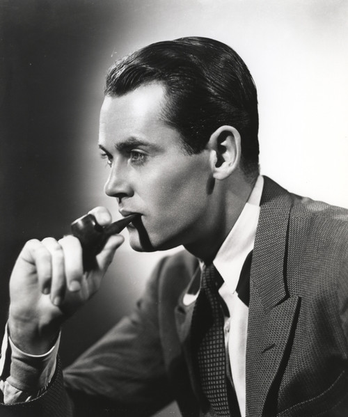 Henry Fonda in a Suit and Tie on a Couch Photo Print - Item # VARCEL689271