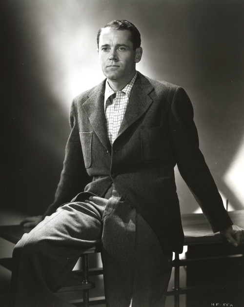 Henry Fonda Black Suit and sitting on a Table Photo Print - Item # VARCEL689300