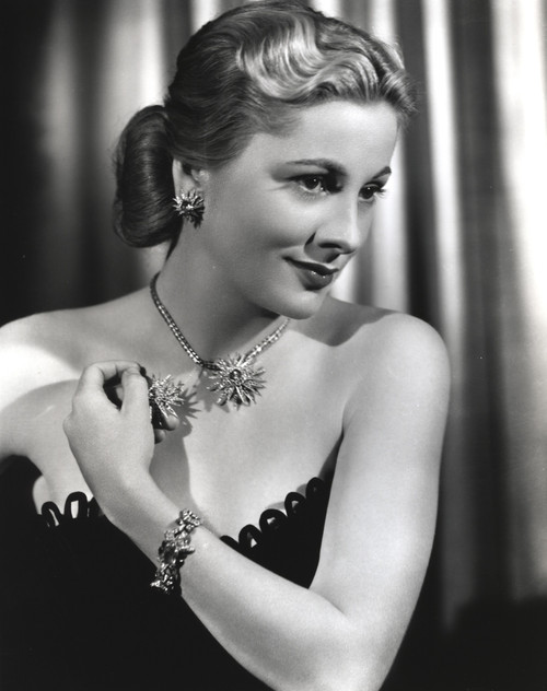 Joan Fontaine wearing a Strapless Black Dress in a Portrait Photo Print - Item # VARCEL689336