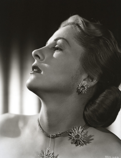 Joan Fontaine Looking Up and Making a Seducing Pose in a Portrait Photo Print - Item # VARCEL689356