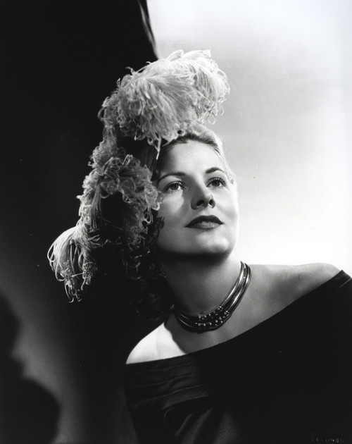 Joan Fontaine Looking Up and wearing a Necklace and a Black Blouse in a Portrait Photo Print - Item # VARCEL689368
