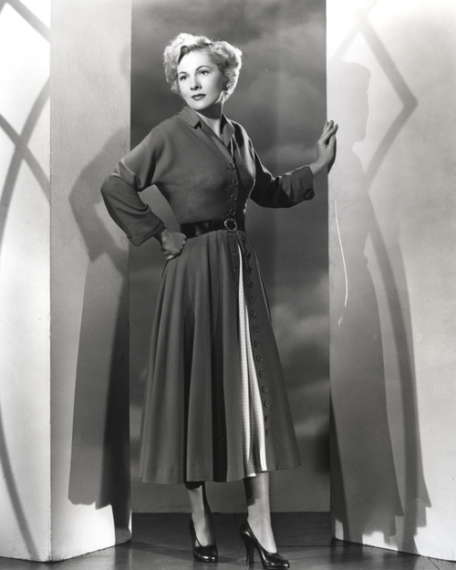 Joan Fontaine standing Between Two Post Photo Print - Item # VARCEL689377