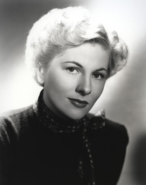 Joan Fontaine wearing a Black Tunic and a Polka Dot Scarf Close Up Portrait Photo Print - Item # VARCEL689382