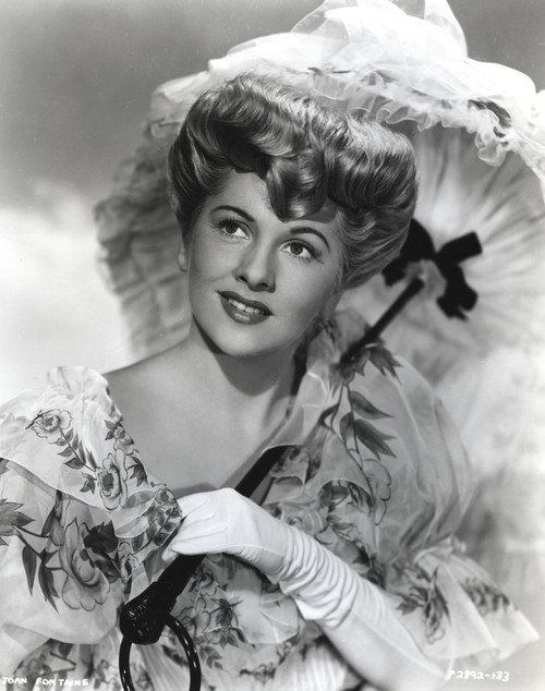 Joan Fontaine wearing a Well Detailed Dress and an Umbrella in a Portrait Photo Print - Item # VARCEL689404