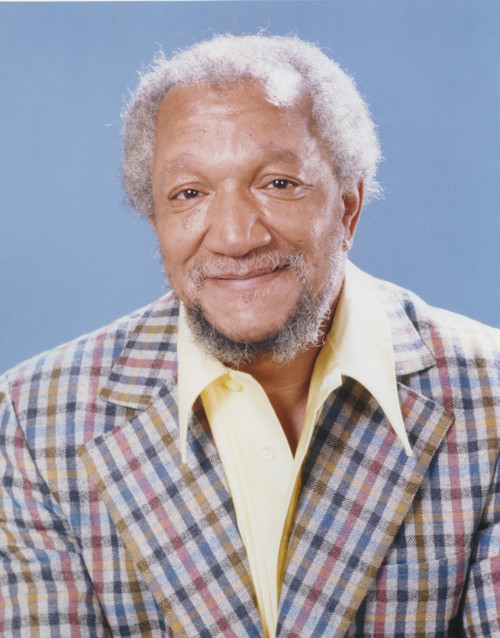 Redd Foxx in Checkered Coat Skyblue Background Portrait Photo Print - Item # VARCEL689495