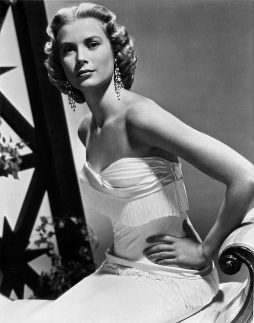 Grace Kelly wearing an evening dress and chandelier earrings Photo Print - Item # VARCEL689612