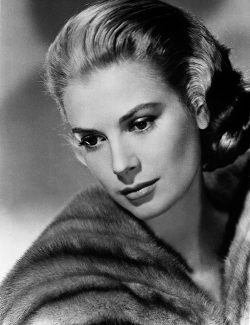 Grace Kelly wearing a fur stole Photo Print - Item # VARCEL689619