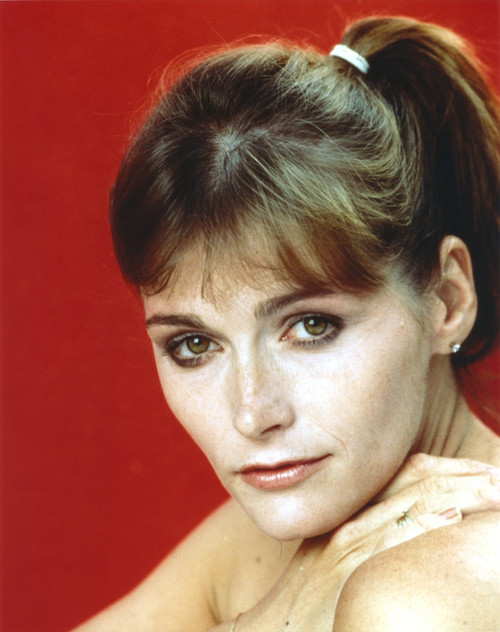 Margot Kidder Close Up Portrait with Red Background Photo Print - Item # VARCEL689656