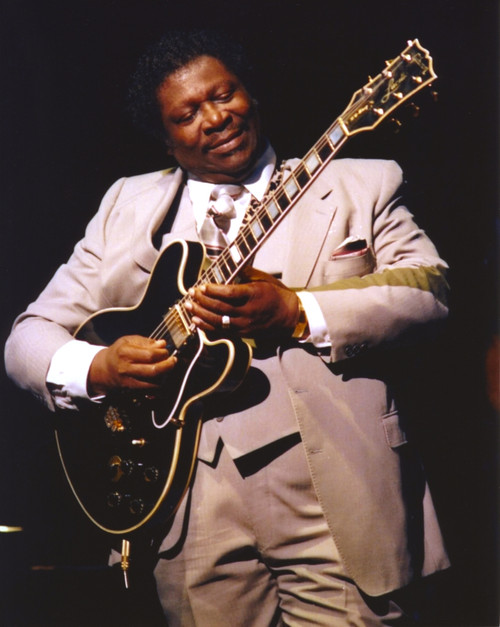 BB King Performing on Stage using Black Les Paul in Grey Suit with White Cuffs and Collar Shirt Photo Print - Item # VARCEL689670