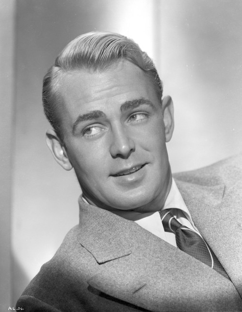 Alan Ladd Leaning Pose wearing a Suit in Black and White Photo Print - Item # VARCEL689817