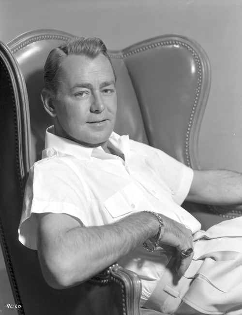 Alan Ladd sitting on a Chair in Close Up Portrait Photo Print - Item # VARCEL689810