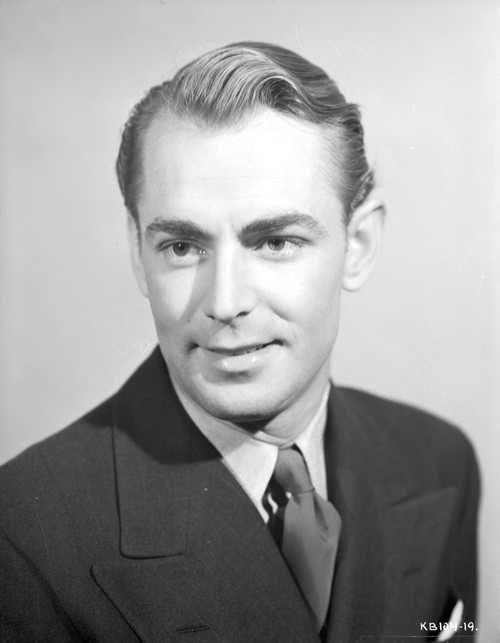 Alan Ladd smiling and Facing Right Close Up Portrait Photo Print - Item # VARCEL689827