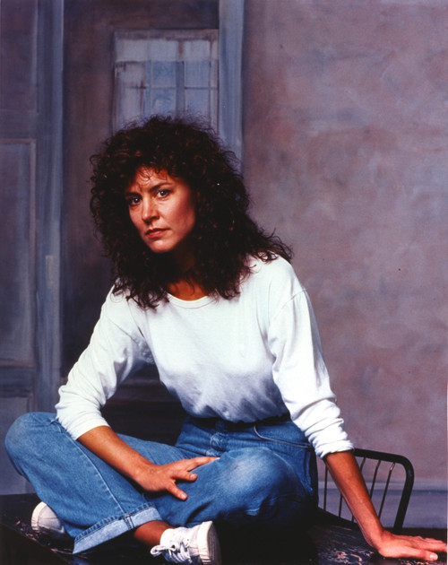 Christine Lahti posed on the Table Photo Print - Item # VARCEL689831