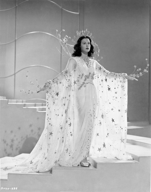 Hedy Lamarr wearing a crown and a star patterned dress Photo Print - Item # VARCEL689862