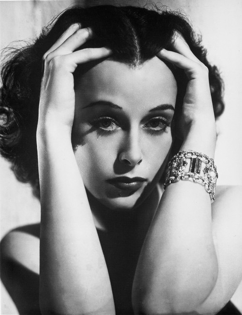 Hedy Lamarr with her hands in her hair Photo Print - Item # VARCEL689864