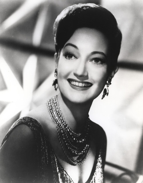 Dorothy Lamour wearing chain necklaces Photo Print - Item # VARCEL689882