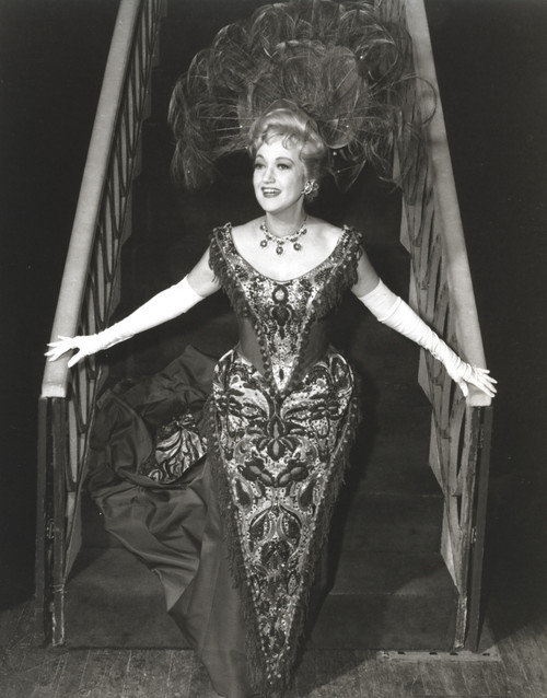 Dorothy Lamour wearing a ball gown and headdress Photo Print - Item # VARCEL689885