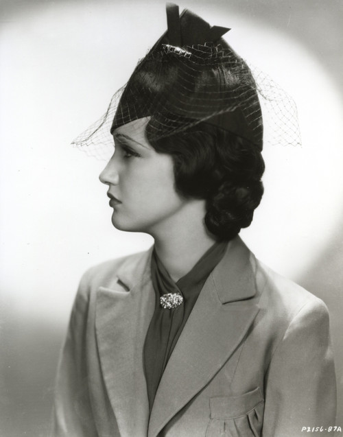 Dorothy Lamour Posed in Black and White with Coat and Scarf Photo Print - Item # VARCEL689904
