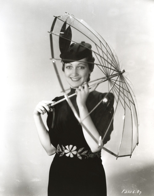 Dorothy Lamour posed in Black and White Portrait with Umbrella Photo Print - Item # VARCEL689929