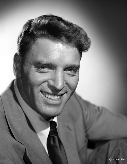 Burt Lancaster wearing Suit in Squat Pose Photo Print - Item # VARCEL690011