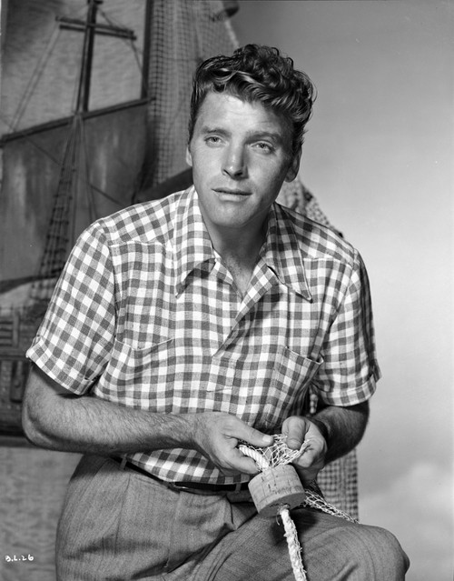 Burt Lancaster wearing a Checkered Polo Shirt and Stripe Slacks Photo Print - Item # VARCEL690007