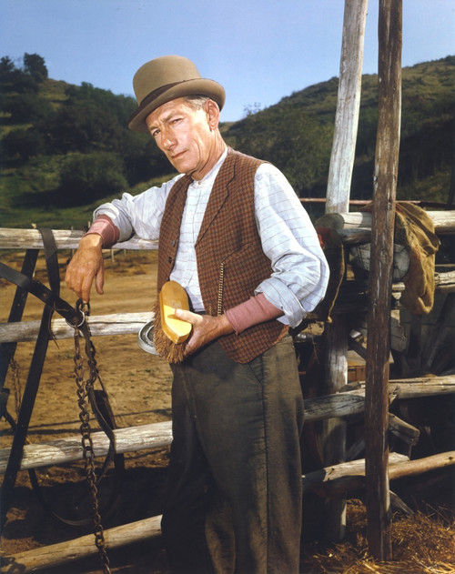 Laramie Cast Member in Cowboy Outfit Holding a Brush Photo Print