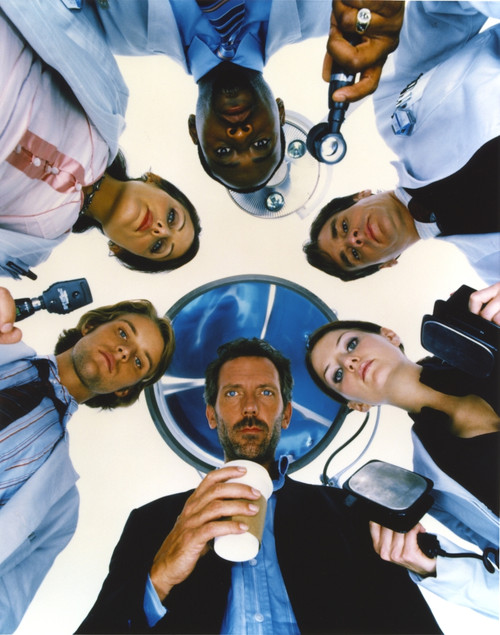 Hugh Laurie Holding a Cup of Coffee Photo Print - Item # VARCEL690071