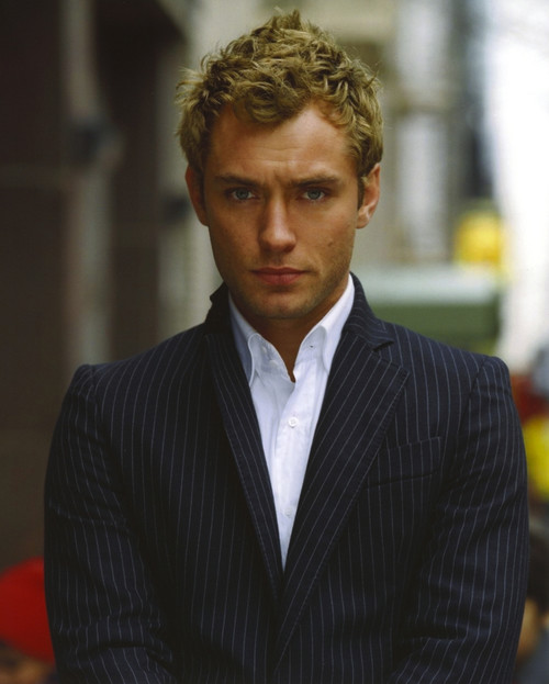 Jude Law Looking at the Camera wearing a Suit and White Undershirt in a Portrait Photo Print - Item # VARCEL690080