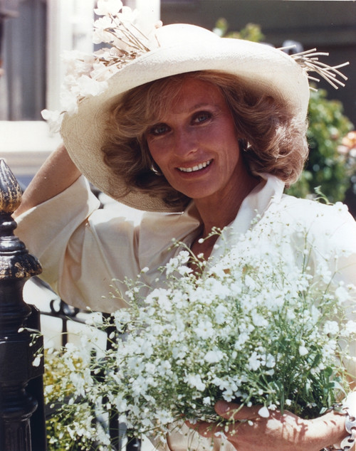 Cloris Leachman in White Dress and Hat Photo Print - Item # VARCEL690122