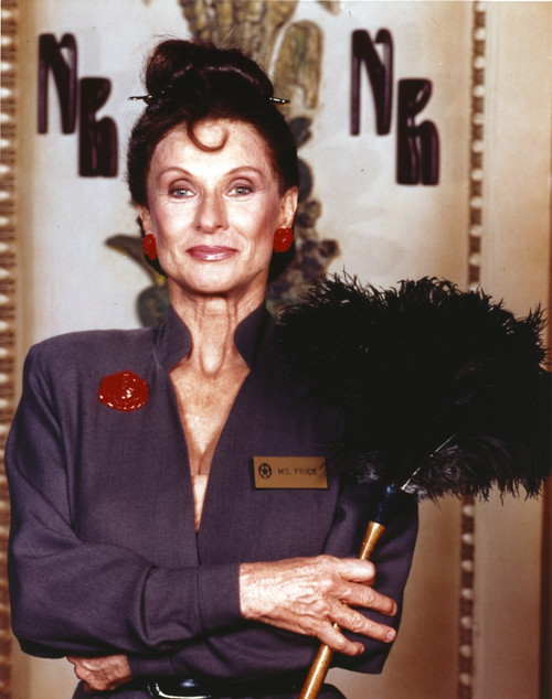 Cloris Leachman Posed in Blue Long Sleeve while Holding a Feather Duster Photo Print - Item # VARCEL690123