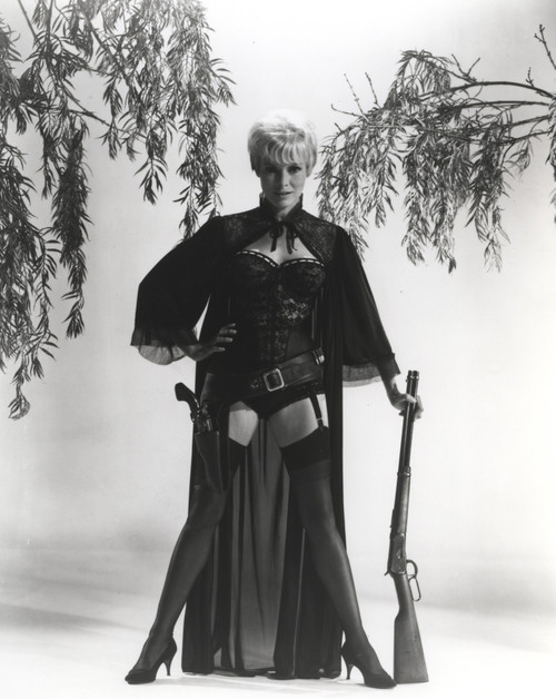 Janet Leigh wearing a corset and holding a rifle Photo Print - Item # VARCEL690182