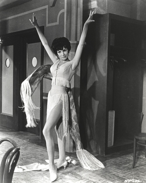 Janet Leigh Posed in White Silk V-Neck Gathered Bodice Sleeveless Dress with Right Foot Forward and Hands Raised Up to the side Photo Print - Item # VARCEL690190